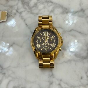 Like new Michael Kors watch with original extra links and box.